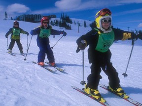 Kids in a ski program in British Columbia. Ski lessons can be tax deductible if they involve child-care.