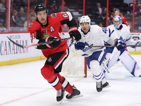 Mark Stone chases the puck with Calle Rosen close on his heels in period one as the Ottawa Senators faced the Toronto Maple Leafs at the Canadian Tire Centre.