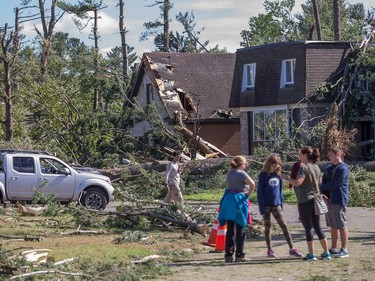 The Arlington Woods neighbourhood suffered heavy damage on Saturday morning as residents in Ottawa's west end deal with the aftermath of the twister that touched down on Friday afternoon.