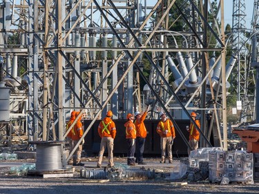 Hydro crews on scene at the Merivale Rd sub station Monday morning as the region continues to deal with the after effects of the tornados that struck the region on Friday
