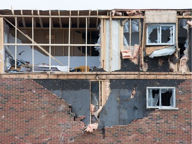 A severely damaged apartment complex on rue Daniel Johnston in Gatineau on Saturday.  All residents living in condemned apartments have to vacate the premises by Sunday, with demolition scheduled to begin Monday.