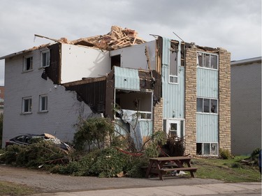 A severely damaged apartment complex on rue Daniel Johnston in Gatineau on Saturday.