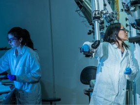 Technicians at work at the TRIUMF laboratory.