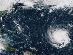 This Sept. 10, 2018, GOES East satellite image provided by NOAA shows Hurricane Florence as it threatens the U.S. East Coast. As mandatory evacuations begin for parts of several East Coast states, millions of Americans have been preparing for what could become one of the most catastrophic hurricanes to hit the Eastern Seaboard in decades.