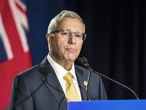 Ontario Finance Minister Vic Fedeli pauses to contemplate the horror of the province’s deficit while speaking with reporters following his Economic Club of Canada speech.