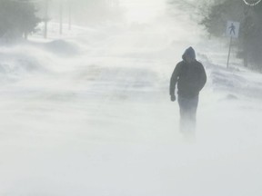 A pedestrian braves the snow in Charlottetown during this  2015 snowstorm.