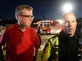 Ottawa Mayor Jim Watson, centre, takes part in a briefing as paramedic gives an update following a tornado in Dunrobin, Ontario west of Ottawa on Friday, Sept. 21, 2018.