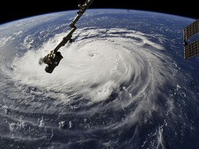 This photo provided by NASA shows Hurricane Florence from the International Space Station on Monday, Sept. 10, 2018, as it threatens the U.S. East Coast. Forecasters said Florence could become an extremely dangerous major hurricane sometime Monday and remain that way for days.