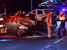 Wreckage from a head on crash on the Champlain Bridge. An SUV slid over the edge, onto an embankment.