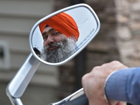 Bhupinder Singh might be the very first Sikh in Alberta to receive a new licence that allows him to ride a motorcycle without a helmet, in Edmonton, May 9, 2018.