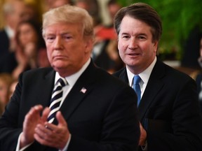 US President Trump (L) during the swearing-in ceremony of Brett Kavanaugh (R) as Associate Justice of the US Supreme Court at the White House in Washington, DC October 8, 2018.
