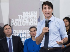 Prime Minister Justin Trudeau speaks to the media and students at Humber College regarding his government's new federally-imposed carbon tax in Toronto on Tuesday, October 23, 2018.