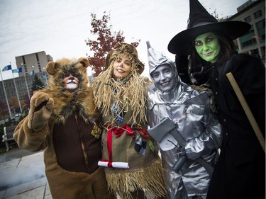The cast of characters at Trick or Treat with the Mayor included, left to right, lion Judy Pritchard, scarecrow Rhonda Barnes, tinman Julie Graveline and witch Krista Kiiffner.   Ashley Fraser/Postmedia