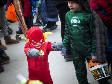 Three-year-old Luke Griffiths dressed as Flash, and his big brother six-year-old Henry was the Green Lantern.   Ashley Fraser/Postmedia