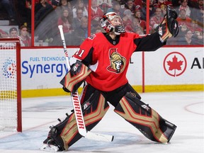 Craig Anderson makes a glove save against the Chicago Blackhawks in the third period at the Canadian Tire Centre on Thursday, Oct. 4, 2018.