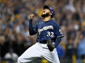 Pitcher Jeremy Jeffress of the Milwaukee Brewers celebrates after the last out of Game 2 of the National League Division Series against the Colorado Rockies at Miller Park on Oct. 5, 2018.