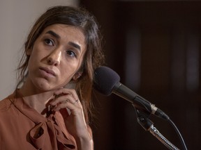 Nadia Murad, a 24-year-old Yazidi woman and co-recipient of the 2018 Nobel Peace Prize takes questions at the National Press Club on October 8, 2018 in Washington, DC.