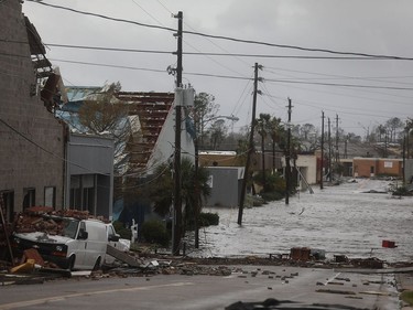 PANAMA CITY, FL - OCTOBER 10:  Damaged buildings and a flooded street are seen after hurricane Michael passed through the downtown area on October 10, 2018 in Panama City, Florida. The hurricane hit the Florida Panhandle as a category 4 storm.