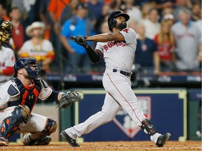 Jackie Bradley Jr. of the Red Sox hits a grand slam home run in the eighth inning against the Astros during Game Three of the American League Championship Series on Tuesday evening.