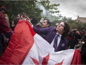 Cannabis users congregate at Trinity Bellwoods Park for a "smoke out" on Oct. 17 in Toronto.