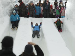 Snow slide at Gatineau's Bal de neige, winter festival in Jacques Cartier Park.