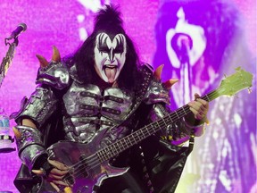 OTTAWA, ONTARIO: July 25, 2013 -- Gene Simmons rocks it out as KISS takes to the stage at Canadian Tire Centre. --- KISS photo agreement for use: ONE TIME USE ONLY. NO SALES OR DISTRIBUTION. NO SOCIAL MEDIA USE.  (Wayne Cuddington / Ottawa Citizen) 113731