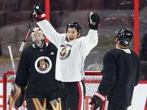 Mark Stone of the Ottawa Senators celebrates his goal on Craig Anderson during morning practice at the Canadian Tire Centre on Wednesday, Oct. 3, 2018.