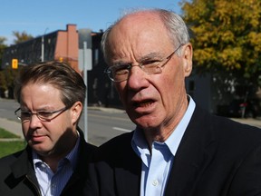 Ottawa mayoral candidate Clive Doucet (R) and Thierry Harris, candidate for Rideau-Vanier councillor, on the hustings in early October.  Doucet didn't always run into such sunny weather during the campaign.