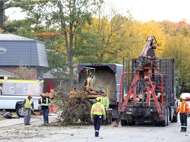 October 12, 2018:  Crews remove trees from the Arlington Woods area in Ottawa due to the damage caused by the tornado, October 12, 2018.