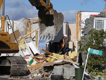 October 12, 2018:  Heavy machinery is used to clear out a house in the Dunrobin area near Ottawa due to the damage caused by the tornado,