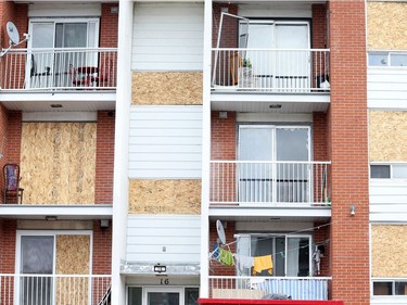 Low rise apartment in Mont-Bleu in Gatineau is all boarded up but people are still living there and drying their laundry outside, October 12, 2018.