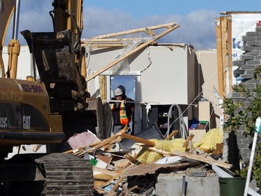 October 12, 2018:  Heavy machinery is used to clear out a house in the Dunrobin area near Ottawa due to the damage caused by the tornado,