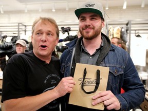 Bruce Linton (left), founder, CEO and Chairman of Canopy Growth, travels from Ottawa to St. John's, Newfoundland on the eve of legalization of pot in Canada to sell the first gram of legal pot from his Tweed store in St. Johns at the stroke of midnight - long before it becomes legal in all the other provinces.