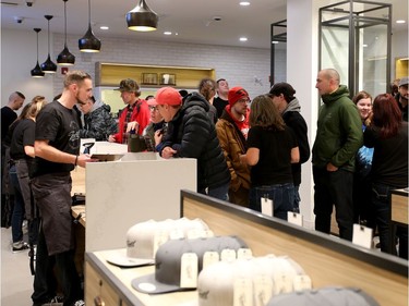 The Tweed store is full with lineups within minutes of opening its doors. Bruce Linton, founder, CEO and Chairman of Canopy Growth, travels from Ottawa to St. Johns, Newfoundland on the eve of legalization of pot in Canada to sell the first gram of legal pot from his Tweed store in St. Johns at the stroke of midnight - long before it becomes legal in all the other provinces.