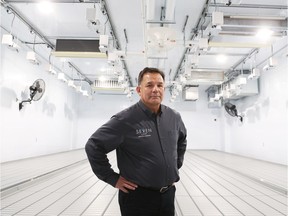 President Lewis Mitchell stands in the Seven Leaf cannabis production facility.