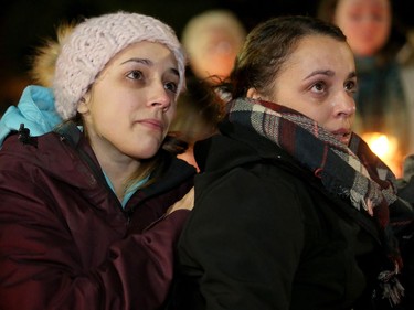 Some of Émilie Maheu's family members couldn't contain their tears as people talked about the young woman at a vigil held in her memory.