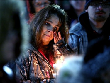 Liane Gregoire wipes away a tear during a vigil held in the memory of Émilie Maheu on Wednesday evening (Oct. 24, 2018) in Alexandria.