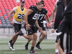 Redblacks long-snapper Louis-Philippe Bourassa has some fun during a practice at TD Place stadium earlier this season. Errol McGihon/Postmedia