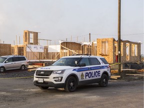 Ottawa Police at the scene of a Barrhaven construction site near Freshwater Way where a 17-year-old boy died Monday night. October 9, 2018.