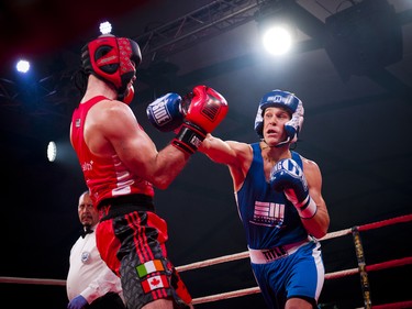 Red team fighter Michael Bradley from the Heart and Crown Irish Pubs battled Derek Newberry of the blue team and an account executive at Humanscale.