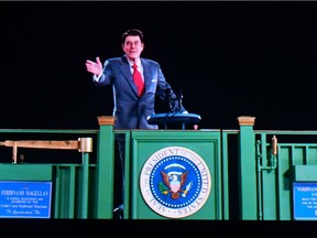 Former US President Ronald Reagan is recreated via Hologram technology during a media preview on October 10, 2018, at the Ronald Reagan Presidential Library in Simi Valley, California. - Reagan appears in three scenes at the presentation, including this scene from a 1984 where he he campaigned from the Ferdinand Magellan Railcar on a campaign trip through Ohio.