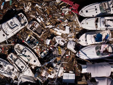 In this aerial view, storm damaged boats are seen in the aftermath of Hurricane Michael on October 11, 2018 in Panama City, Florida. - Residents of the Florida Panhandle woke to scenes of devastation Thursday after Michael tore a path through the coastal region as a powerful hurricane that killed at least two people.