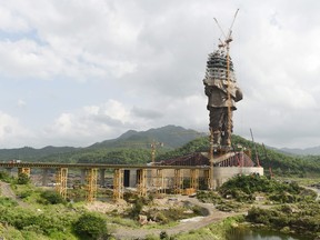 In this file photo taken on August 25, 2018 a statue dedicated to Indian independence leader Sardar Vallabhbhai Patel is pictured during its construction, overlooking the Sardar Sarovar Dam near Vadodara in India's western Gujarat state.