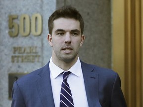 n this March 6, 2018 file photo, Billy McFarland, the promoter of the failed Fyre Festival in the Bahamas, leaves federal court after pleading guilty to wire fraud charges in New York. A federal judge has given McFarland a six-year prison term. McFarland was sentenced Thursday, Oct. 11 in Manhattan federal court. Judge Naomi Reice Buchwald called him a “serial fraudster.”