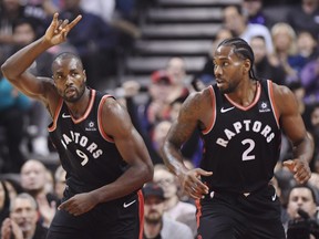Serge Ibaka and Kawhi Leonard (2) during first halfl action in Toronto against Charlotte on Monday, October 22, 2018.