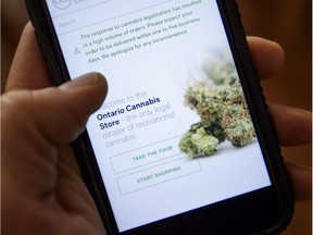 A Ontario Cannabis Store website pictured on a mobile phone Ottawa on Thursday, Oct. 18, 2018., claiming high volume of orders and an apology for any inconvenience.