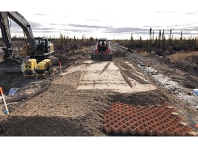 Members of a work group take part in the repair work on the railway to Churchill, Manitoba in this handout image. The new owner of the railway to Churchill, Man., says washouts that have kept the line closed since spring 2017 have now been repaired, allowing some vehicles to travel along the link.