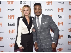 Julia Roberts, left, and Stephan James attend a premiere for "Homecoming" at the Toronto International Film Festival at the Ryerson Theatre on Friday, Sept. 7, 2018, in Toronto.