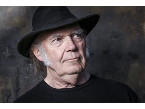 In this May 18, 2016, file photo, Neil Young poses for a portrait in Calabasas, Calif. Young has confirmed he's most definitely married to Daryl Hannah.