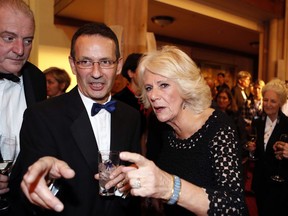 Britain's Camilla, the Duchess of Cornwall talks to guests before she presents the Man Booker Prize for Fiction 2018 during the prize's 50th year at the Guildhall in London, Tuesday, Oct. 16, 2018.